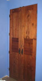 door from used redwood decking
